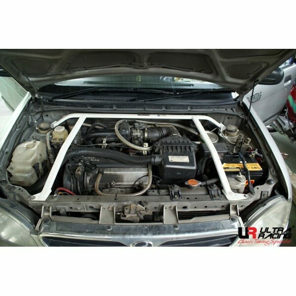Image of Daihatsu Cuore 99-04 UltraRacing 4-Point Front Upper Bar 018
