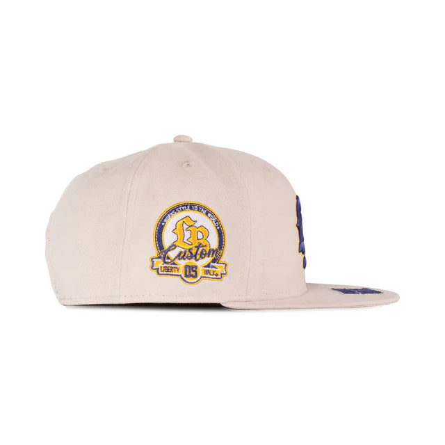 NEWERA 9FIFTY LB CAP Liberty Walk front Logo Stone x Blue
